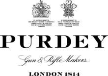 Purdey Gun & Rifle Makers in black letters on a white background surmounted by two royal warrants