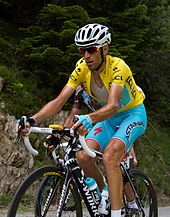 Vincenzo Nibali wearing a yellow cycling jersey.