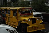 Yellow traditional jeepney heading to Taytay, Rizal