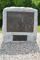 A plaque erected by the Commonwealth of Massachusetts commemorating the achievements of the volunteer militia