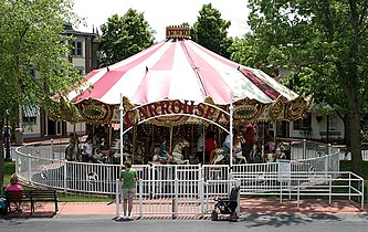 Town Square Carrousel at Adventureland in Altoona, Iowa (Chance-Morgan). Also has a decorative crown for a top.