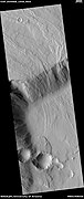Close view of lava moving over cliff around Olympus Mons, as seen by HiRISE under HiWish program
