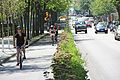 Group of cyclists using a bike lane in Vancouver, Canada