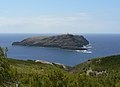 Ilhéu de Ferro visto do Porto Santo com o seu farol no promontório