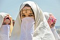 Algerian women wearing haik