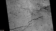 Close-up of part of floor of Bernard Crater showing troughs and dust devil tracks, as seen by CTX camera (on Mars Reconnaissance Orbiter).