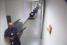 Aaron Alexis holding a gun during his deadly rampage in the Washington Navy Yard