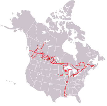 A map of the Canadian National Railway system, showing the system marked in red lines across the continental United States and Canada.