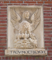 Same pelican feeding its young in Haarlem gablestone of former meeting hall "Trou Moet Blycken", accompanied by gable stone (not shown) dated 1609