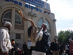 Hasidic Jew, blowing the kudu shofar in Uman, Ukraine, 2010.