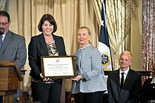 Jeanette Richardson-Baars with then Secretary of State Hillary Clinton