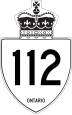 Highway 112 marker