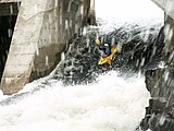 Skilled Kayaker Sadia Loney descending the unobstructed sluiceway of the Laniel Dam