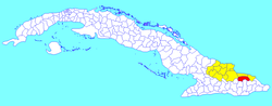 Sagua de Tánamo municipality (red) within Holguín Province (yellow) and Cuba