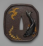 Tsuba with the Koi and Seaweed Motif, made by Kansai. Edo period. The Metropolitan Museum of Art.