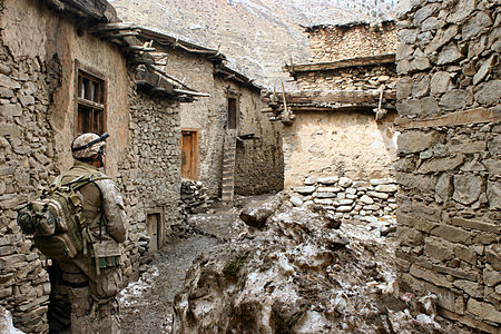 Camouflaged Marine in Afghanistan, by Hospital Corpsman Alonzo Gonzales