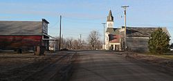 Loma. At left is the Bar M Corral bar; at right is St. Luke's Czech Catholic Shrine.