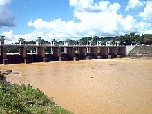 Polgolla barrage as seen from the downstream when the Victoria reservoir has reached full capacity and has inundated a portion of the barrage.