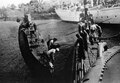 The three submarines were moved to Stockholm for repairs in April 1940. The crews were housed on the sailing ship Dar Pomorza, seen in the background.