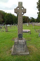 Large stone memorial to Green