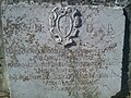 A remaining tombstone of the former graveyard