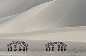 ATHLETE rovers traverse the desert terrain adjacent to Dumont Dunes, California