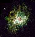إن جي سي 604 في مجرة المثلث. وهي منطقة هيدروجين II تكثر فيها نشأة نجوم جديدة.