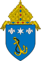 The arms of the Archdiocese of Anchorage: The anchor references the namesake of the see, Anchorage, Alaska.