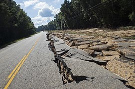 A crumbled section of LA 10 near Clinton, Louisiana, one month after 2016 flooding