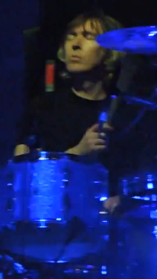 Ó Cíosóig performing with My Bloody Valentine in 2013