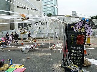 Part of The Happy Gadfly (Umbrella Square)