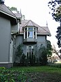 Southeast-facing second floor bay window added by widow Moss