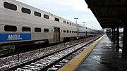 A Metra Train, with the closest two cars being Budd, the second from the rear being Nippon Sharyo, and the rearmost car being Amerail.