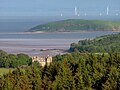 Orchardton Castle with Hestan and windfarm.