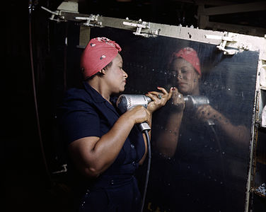 Woman working on a Vultee A-31 Vengeance, by Alfred T. Palmer (edited by Diliff)
