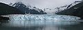 Mount Grosvenor (left) partially in clouds behind Meares Glacier