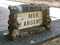 Mur d'argent du marché, où s’échangeait l'argent des transactions entre vendeurs et acheteurs.