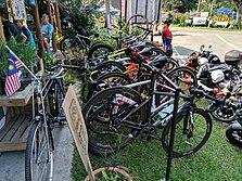 Road bike stacked in a bicycle parking
