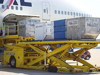 A unit load device Unloading LD3 containers from a Boeing 747