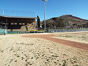 Concrete grandstand and home plate.