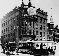 The Women's Christian Temperance Union building, also known as Temperance Temple, at Temple and Fort (now Broadway) streets, with a Temple Street Cable Railway car, 1890