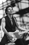 Bruce Springsteen playing guitar.