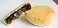 Image 20Eccles cake is a small round flaky pastry cake filled with currants, sugar and spice. It is native to Eccles. (from Greater Manchester)