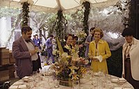 Ford and Social Secretary Maria Downs give the media a tour of the tent erected in the South Lawn for the July 1976 state dinner honoring Queen Elizabeth II and Prince Philip of Great Britain.