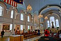 Interior of St. Paul's Chapel with L'Enfant's ornamental treatment (far right) above the altar