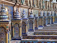 The tiled Provincial Alcoves along the walls of the Plaza de España