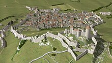 Restitution 3D au milieu du XVe siècle. Vue de l'est en plongée du château de Grimont et du bourg fortifié de Poligny (extrait de http://www.jura-3d.fr).