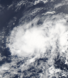 Satellite image of elliptical cloud pattern with no clear center