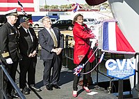 Susan Ford Bales, daughter of President Gerald R. Ford, christens Gerald R. Ford.