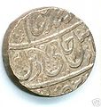 (===Description=== A silver ashrafi issued by Asif ud-Daulah from the Najibabad mint in AH 1211 (1796/7), regnal year 38. ===Source=== http://ftp.kermit-project.org/itc/mealac/pritchett/00routesdata/1700_1799/avadh_early/asifuddaulah/asifuddaulah.html)